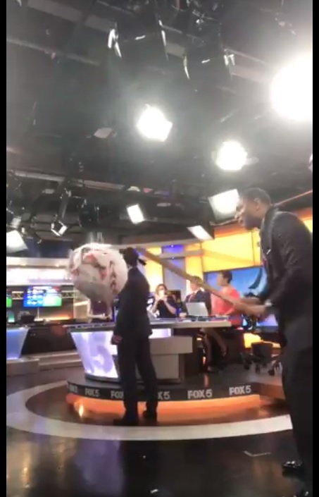FOX 5 Anchors hit a Bryce Harper Pinata