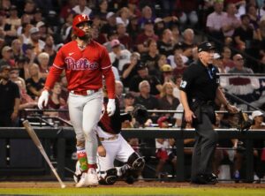 Philadelphia Phillies first baseman Bryce Harper (3) watches his solo home run against the Arizona Diamondbacks in the sixth inning in Game 5 of the NLCS of the 2023 MLB playoffs at Chase Field on Oct. 21, 2023, in Phoenix, AZ. The Phillies beat the Diamondbacks 6-1, giving Philadelphia the overall lead of 3-2 in the NLCS playoffs.