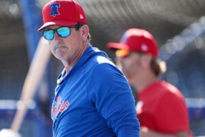 Feb 25, 2024; Clearwater, Florida, USA; Philadelphia Phillies manager Rob Thomson (59) directs batting practice before a game against the New York Yankees at BayCare Ballpark.