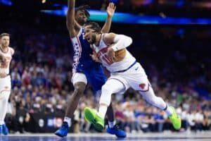 May 2, 2024; Philadelphia, Pennsylvania, USA; New York Knicks guard Jalen Brunson (11) drives against Philadelphia 76ers guard Tyrese Maxey (0) during the first half of game six of the first round for the 2024 NBA playoffs at Wells Fargo Center.