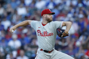 Jul 3, 2024; Chicago, Illinois, USA; Philadelphia Phillies starting pitcher Zack Wheeler (45) delivers a pitch against the Chicago Cubs during the second inning at Wrigley Field.