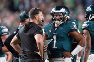 Sep 16, 2024; Philadelphia, Pennsylvania, USA; Philadelphia Eagles quarterback Jalen Hurts (1) talks with head coach Nick Sirianni during a timeout in the first quarter against the Atlanta Falcons at Lincoln Financial Field. Mandatory Credit: