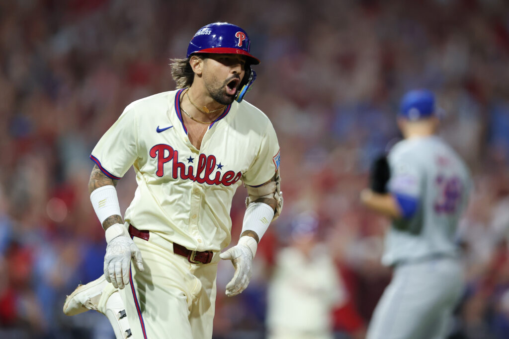 Oct 6, 2024; Philadelphia, Pennsylvania, USA; Philadelphia Phillies outfielder Nick Castellanos (8) reacts after hitting a walk off game winning RBI single during the ninth inning against the New York Mets in game two of the NLDS for the 2024 MLB Playoffs at Citizens Bank Park.