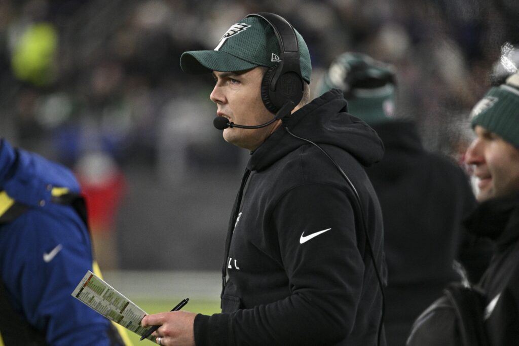 Dec 1, 2024; Baltimore, Maryland, USA; Philadelphia Eagles offensive coordinator Kellen Moore on the sidelines during the first half against the Baltimore Ravens at M&T Bank Stadium.