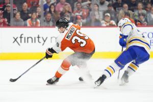 Mar 29, 2025; Philadelphia, Pennsylvania, USA; Philadelphia Flyers right wing Matvei Michkov (39) shoots and scores a goal against the Buffalo Sabres in the second period at Wells Fargo Center.