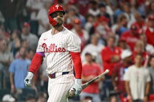 Oct 6, 2025; Philadelphia, Pennsylvania, USA; Philadelphia Phillies first baseman Bryce Harper (3) reacts to striking out against the Los Angeles Dodgers in the sixth inning during game two of the NLDS round for the 2025 MLB playoffs at Citizens Bank Park.