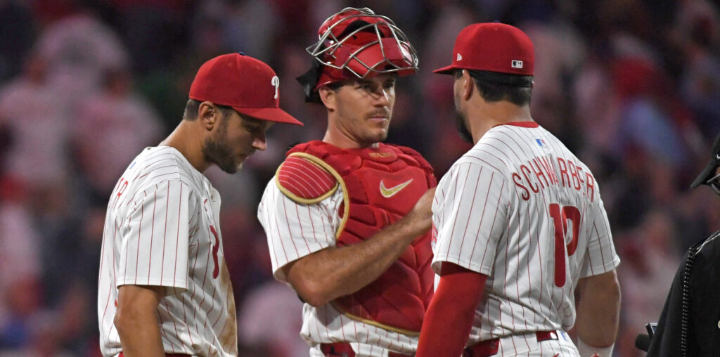Aug 18, 2025; Philadelphia, Pennsylvania, USA; Philadelphia Phillies shortstop Trea Turner (7), catcher J.T. Realmuto (10) and outfielder Kyle Schwarber (12) celebrate win against the Seattle Mariners at Citizens Bank Park.