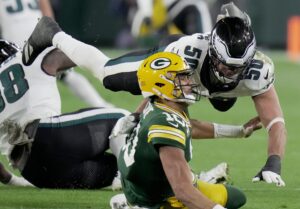 Philadelphia Eagles linebacker Jaelan Phillips (50) pressures Green Bay Packers quarterback Jordan Love (10) during the fourth quarter of their game Monday, November 10, 2025 at Lambeau Field in Green Bay, Wisconsin.