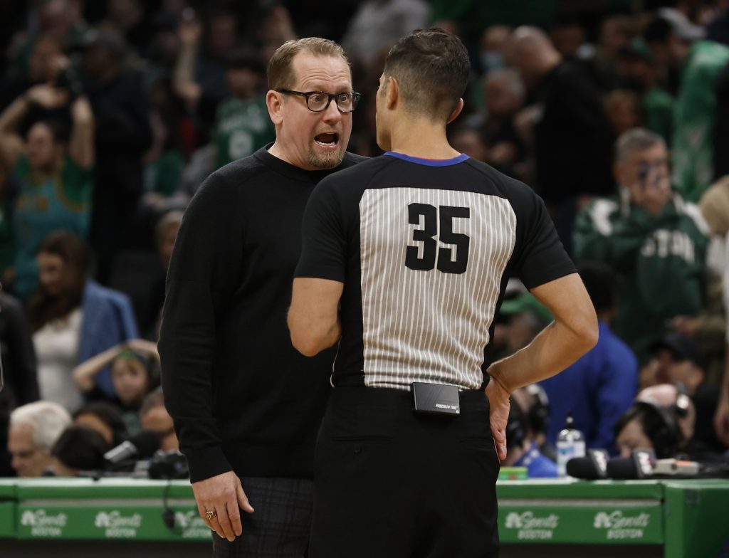 Apr 7, 2023; Boston, Massachusetts, USA; Toronto Raptors head coach Nick Nurse talks with referee Jason Goldenberg (35) during the second half of their loss to the Boston Celtics at TD Garden.