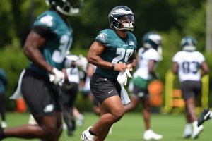 Jun 10, 2025; Philadelphia, PA, USA; Philadelphia Eagles running back A.J. Dillon (29) warms up at NovaCare Complex. Mandatory Credit: