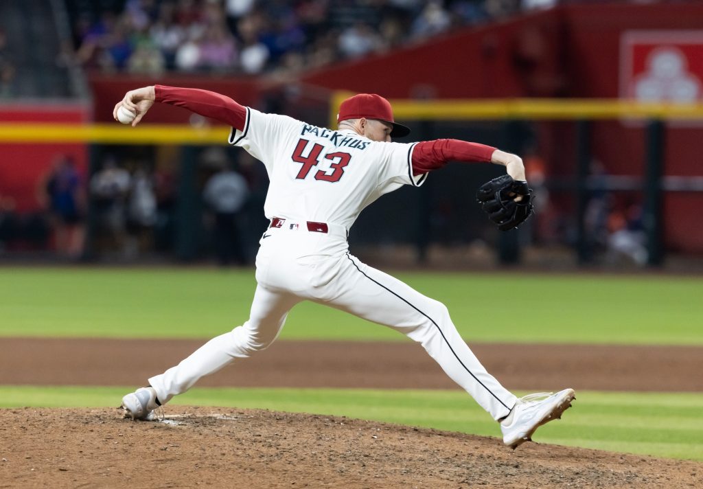 Jul 22, 2025; Phoenix, Arizona, USA; Arizona Diamondbacks pitcher Kyle Backhus against the Houston Astros at Chase Field.