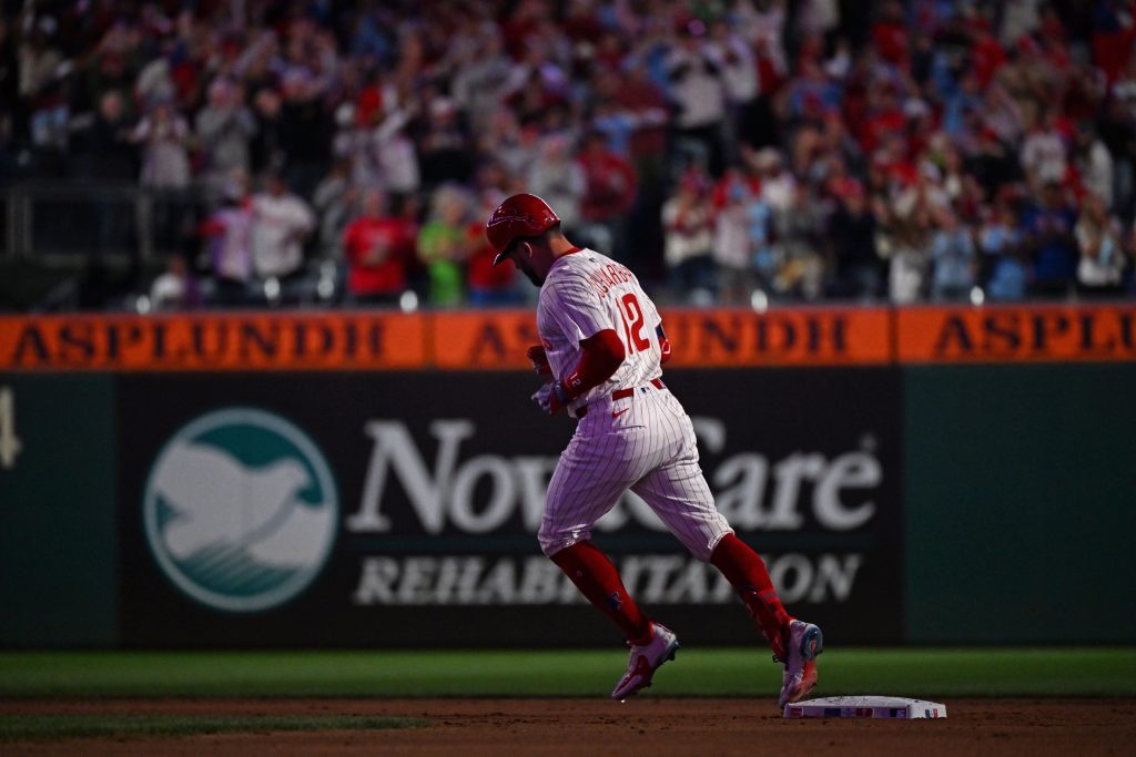 Sep 9, 2025; Philadelphia, Pennsylvania, USA; Philadelphia Phillies outfielder Kyle Schwarber (12) runs the bases after hitting his 50th home run of the season during the seventh inning against the New York Mets at Citizens Bank Park.