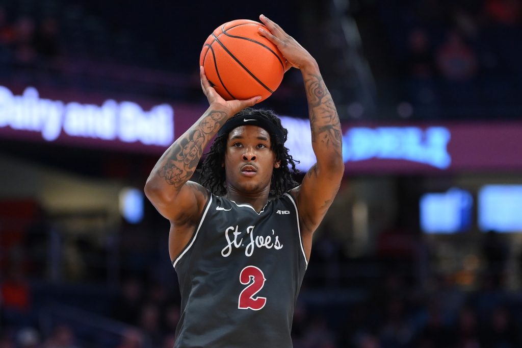 Dec 11, 2025; Syracuse, New York, USA; Saint Joseph's Hawks guard Deuce Jones (2) shoots against the Syracuse Orange during the first half at the JMA Wireless Dome.