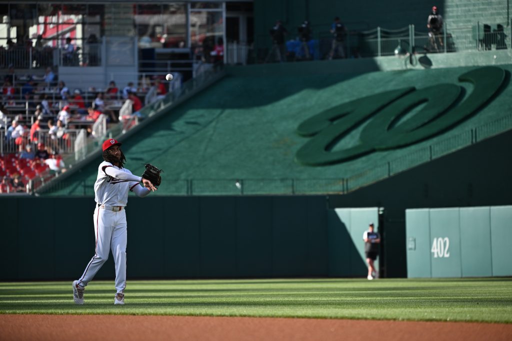 Jul 1, 2024; Washington, District of Columbia, USA; Washington Nationals center fielder James Wood (50) warms up in the outfield before his Major League Baseball debut against the New York Mets at Nationals Park.