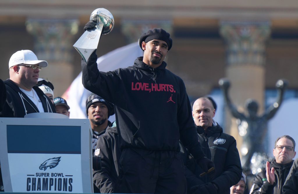 Feb 14, 2025; Philadelphia, PA, USA; Philadelphia Eagles quarterback Jalen Hurts holds the Vince Lombardi Trophy during the Super Bowl LIX championship parade and rally.