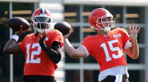Cleveland Browns quarterback Joe Flacco (15) and quarterback Shedeur Sanders (12) look downfield during NFL training camp at CrossCountry Mortgage Campus, Wednesday, July 30, 2025, in Berea, Ohio.