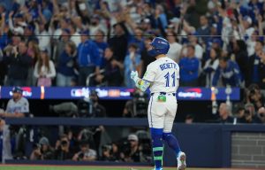 Nov 1, 2025; Toronto, Ontario, CAN; Toronto Blue Jays shortstop Bo Bichette (11) reacts after hitting a three run home run against the Los Angeles Dodgers in the third inning for game seven of the 2025 MLB World Series at Rogers Centre.