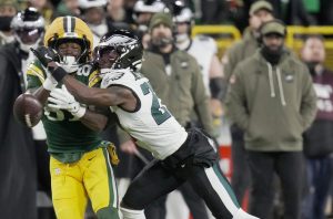 Philadelphia Eagles cornerback Quinyon Mitchell (27) breaks up a pass intended for Green Bay Packers wide receiver Romeo Doubs (87) during the second quarter of their game Monday, November 10, 2025 at Lambeau Field in Green Bay, Wisconsin.