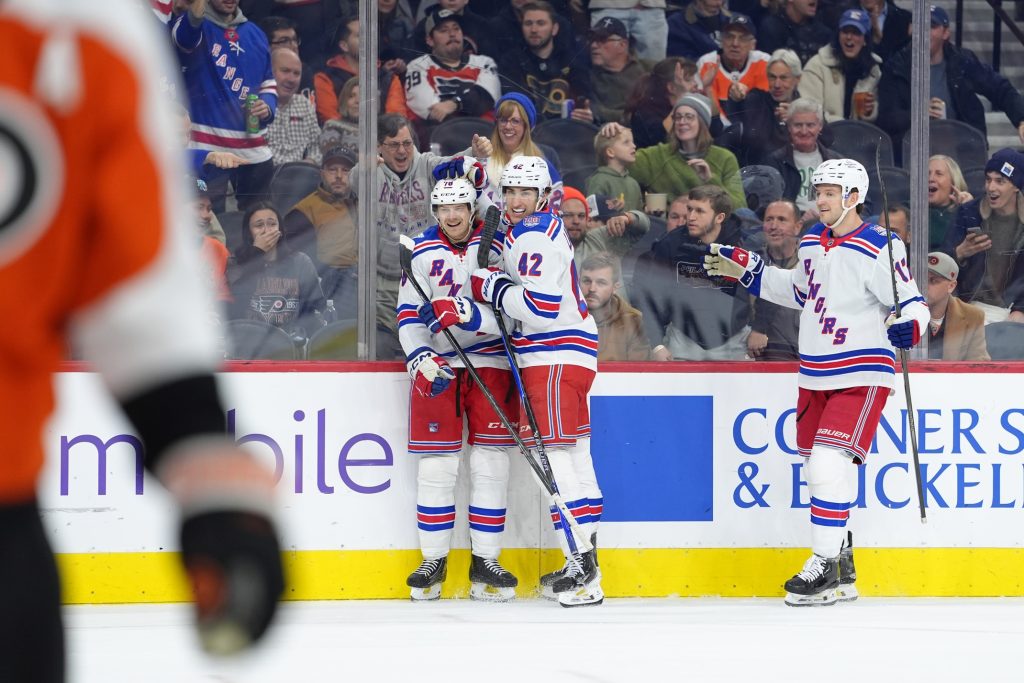 Jan 17, 2026; Philadelphia, Pennsylvania, USA; New York Rangers left wing Brennan Othmann (78) reacts with teammates after scoring a goal against the Philadelphia Flyers in the first period at Xfinity Mobile Arena.