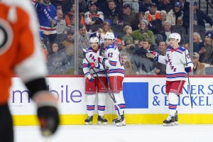 Jan 17, 2026; Philadelphia, Pennsylvania, USA; New York Rangers left wing Brennan Othmann (78) reacts with teammates after scoring a goal against the Philadelphia Flyers in the first period at Xfinity Mobile Arena.