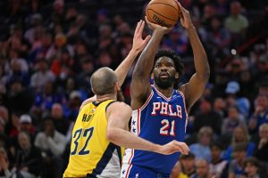 Jan 19, 2026; Philadelphia, Pennsylvania, USA; Philadelphia 76ers center Joel Embiid (21) shoots over Indiana Pacers center Jay Huff (32) during the first quarter at Xfinity Mobile Arena.