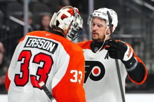 Jan 19, 2026; Las Vegas, Nevada, USA; Philadelphia Flyers right wing Travis Konecny (11) congratulates Philadelphia Flyers goaltender Samuel Ersson (33) after the Flyers defeated the Vegas Golden Knights 2-1 at T-Mobile Arena.