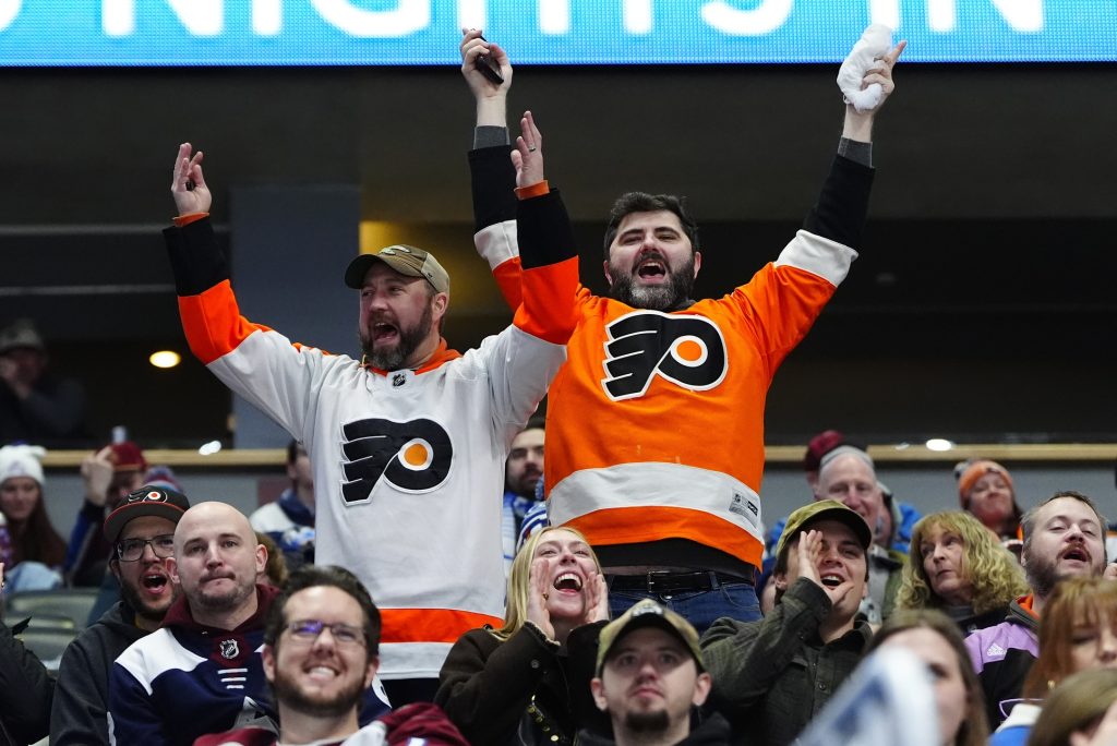 Jan 23, 2026; Denver, Colorado, USA; Philadelphia Flyers fans celebrate during the third period against the Colorado Avalanche at Ball Arena. Mandatory Credit: