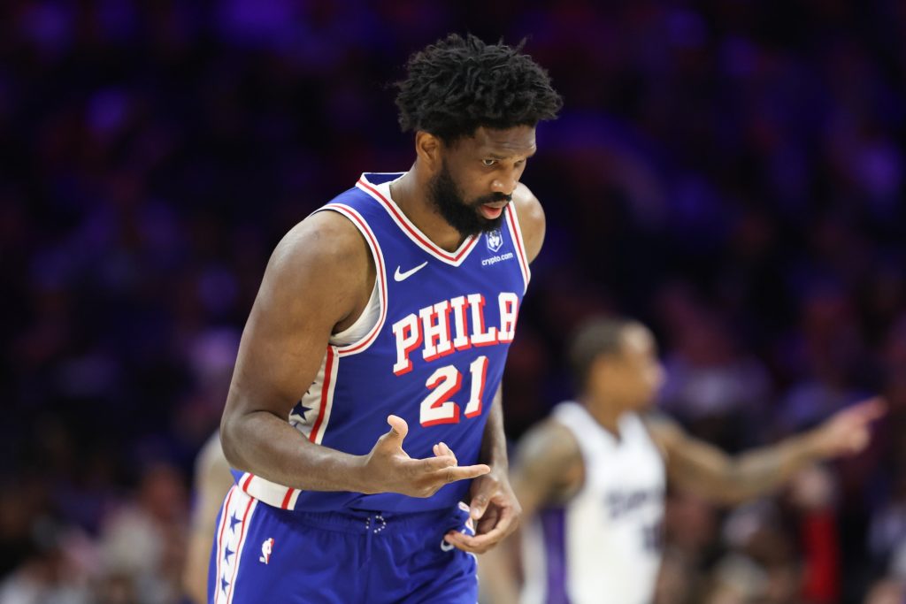 Jan 29, 2026; Philadelphia, Pennsylvania, USA; Philadelphia 76ers center Joel Embiid (21) reacts to his three pointer against the Sacramento Kings during the second quarter at Xfinity Mobile Arena. Mandatory Credit: