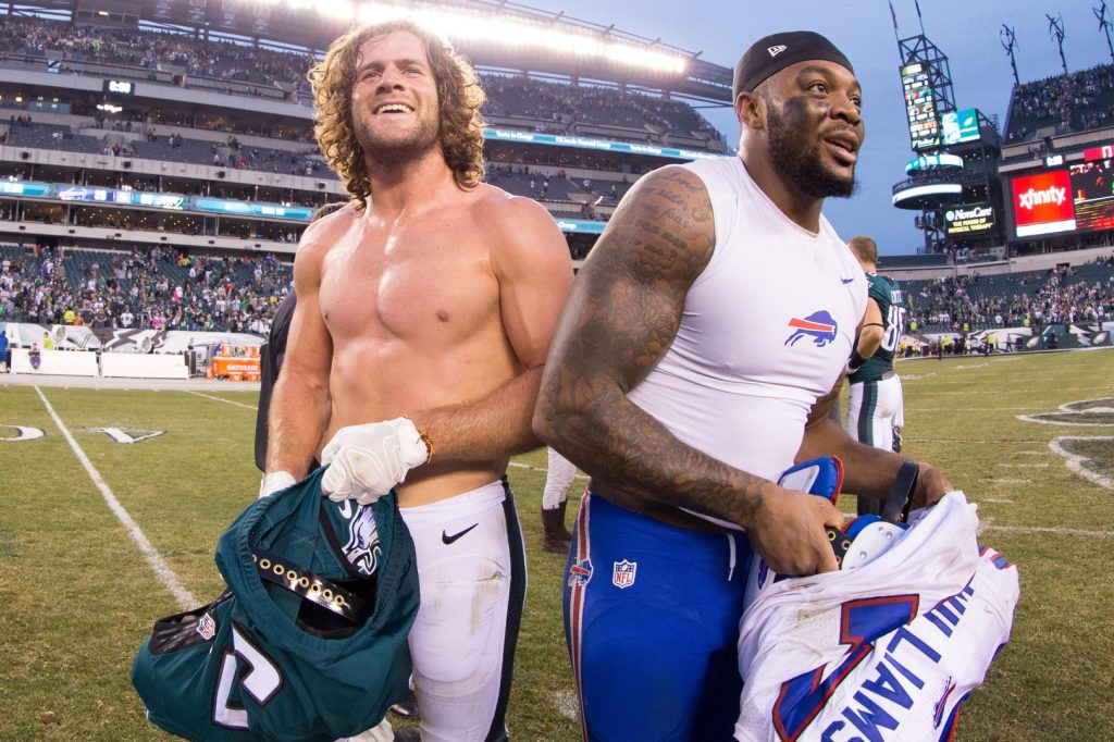 Dec 13, 2015; Philadelphia, PA, USA; Philadelphia Eagles linebacker Kiko Alonso (L) and Buffalo Bills strong safety Duke Williams (R) swap jerseys after the game at Lincoln Financial Field. The Eagles won 23-20.
