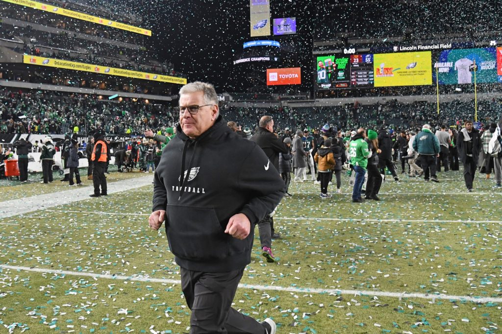 Jan 26, 2025; Philadelphia, PA, USA; Philadelphia Eagles offensive line coach Jeff Stoutland runs off the field after win against the Washington Commanders in the NFC Championship game at Lincoln Financial Field.