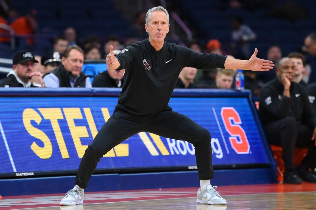 Dec 11, 2025; Syracuse, New York, USA; Saint Joseph's Hawks head coach Steve Donahue reacts against the Syracuse Orange during the second half at the JMA Wireless Dome.