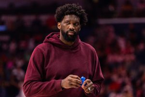Feb 21, 2026; New Orleans, Louisiana, USA; Philadelphia 76ers center Joel Embiid (21) looks on against the New Orleans Pelicans during the first half at Smoothie King Center.