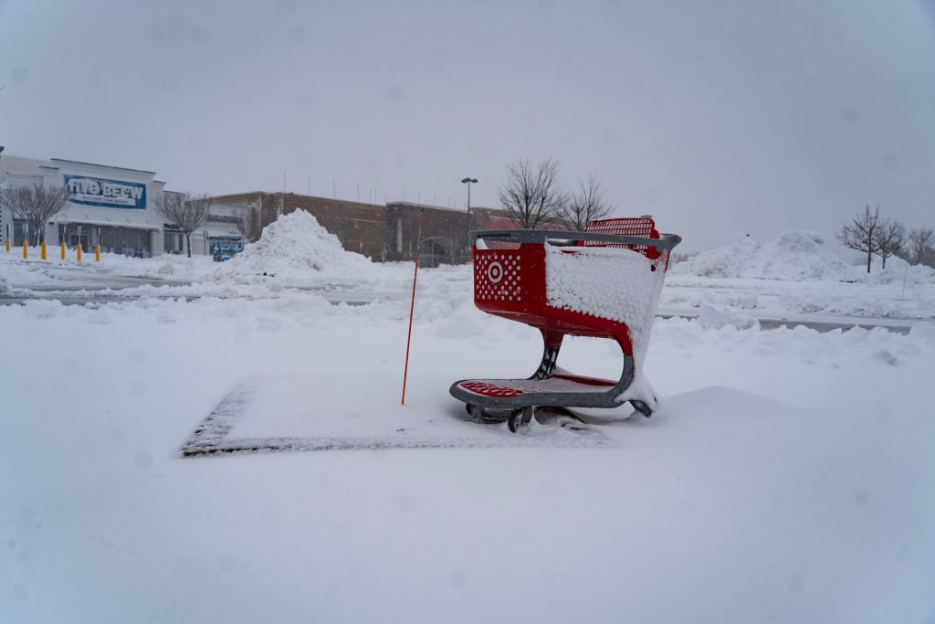 Plows clear the parking lot of an Ocean Township plaza after a storm dumps over a foot of snow throughout much of the state. Monday, February 23, 2026.
