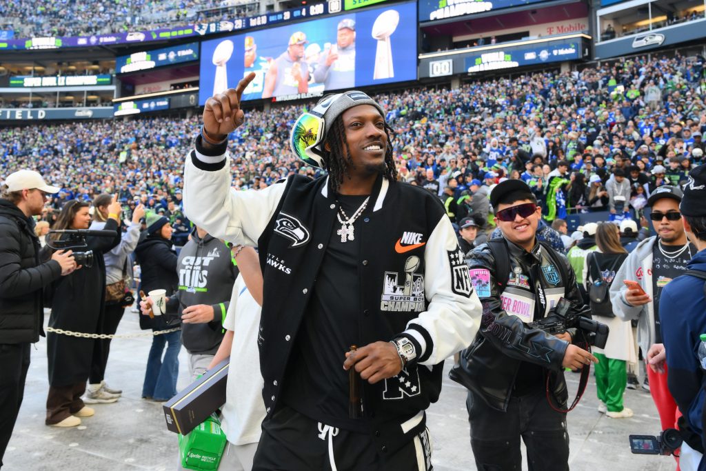 Feb 11, 2026; Seattle, WA, USA; Seattle Seahawks cornerback Riq Woolen (27) before the Super Bowl LX trophy presentation at Lumen Field.