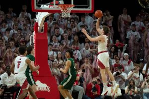 Miami RedHawks guard Peter Suder (5) shoots a layup over Ohio Bobcats guard JJ Kelly (4) in the first half of the NCAA basketball game at Millett Hall in Oxford, Ohio, on Friday, Feb. 13, 2026.