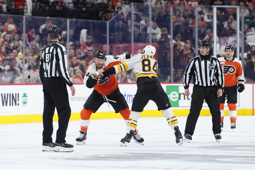 Feb 28, 2026; Philadelphia, Pennsylvania, USA; Philadelphia Flyers left wing Nicolas Deslauriers (44) fights Boston Bruins left wing Tanner Jeannot (84) in the first period at Xfinity Mobile Arena.