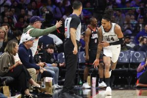 Mar 3, 2026; Philadelphia, Pennsylvania, USA; San Antonio Spurs guard Devin Vassell (24) reacts to his three pointer against the Philadelphia 76ers during the third quarter at Xfinity Mobile Arena.