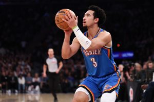 Mar 4, 2026; New York, New York, USA; Oklahoma City Thunder guard Jared McCain (3) shoots the ball against the New York Knicks during the first half at Madison Square Garden.