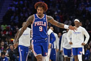 Mar 10, 2026; Philadelphia, Pennsylvania, USA; Philadelphia 76ers guard Kelly Oubre Jr. (9) against the Memphis Grizzlies during the fourth quarter at Xfinity Mobile Arena.