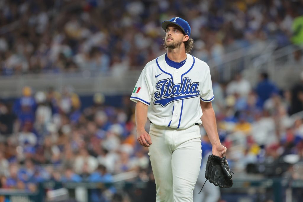 Mar 16, 2026; Miami, FL, United States; Italy pitcher Aaron Nola (27) walks off the diamond after pitching the third inning against Venezuela during a semifinal game of the 2026 World Baseball Classic at loanDepot Park.