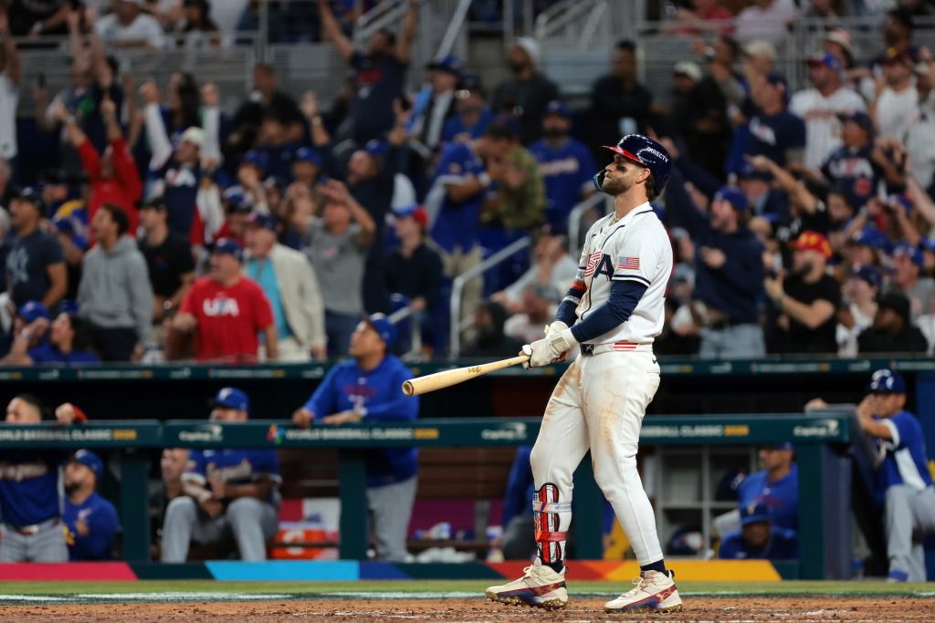 Mar 17, 2026; Miami, FL, United States;United States first baseman Bryce Harper (24) hits a two run home run against Venezuela in the eighth inning during the 2026 World Baseball Classic Championship game at loanDepot Park.