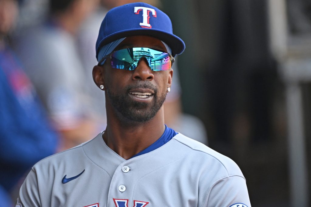 Mar 29, 2026; Philadelphia, Pennsylvania, USA; Texas Rangers outfielder Andrew McCutchen (4) in the dugout before game against the Philadelphia Phillies at Citizens Bank Park.