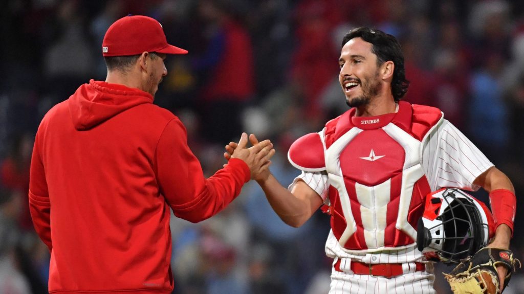 Sep 27, 2023; Philadelphia, Pennsylvania, USA; Philadelphia Phillies catcher Garrett Stubbs (21) and catcher J.T. Realmuto (10) celebrate finally out in win against the Pittsburgh Pirates at Citizens Bank Park.