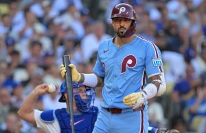 Oct 9, 2025; Los Angeles, California, USA; Philadelphia Phillies right fielder Nick Castellanos (8) reacts after striking out in the fifth inning against the Los Angeles Dodgers during game four of the NLDS round for the 2025 MLB playoffs at Dodger Stadium. Mandatory Credit: Jayne Kamin-Oncea-Imagn Images
