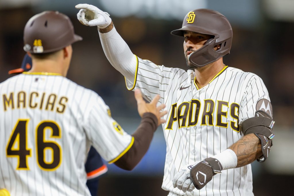 Mar 28, 2026; San Diego, California, USA; San Diego Padres designated hitter Nick Castellanos (21) celebrates after hitting a single during the sixth inning against the Detroit Tigers at Petco Park.