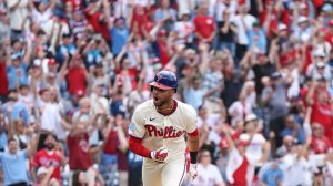 Apr 1, 2026; Philadelphia, Pennsylvania, USA; Philadelphia Phillies center fielder Justin Crawford (2) reacts as he hits a walk off game winning RBI single during the tenth inning against the Washington Nationals at Citizens Bank Park.