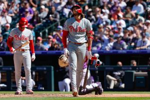 Apr 5, 2026; Denver, Colorado, USA; Philadelphia Phillies third baseman Alec Bohm (28) reacts to an ABS call in the fourth inning against the Colorado Rockies at Coors Field.