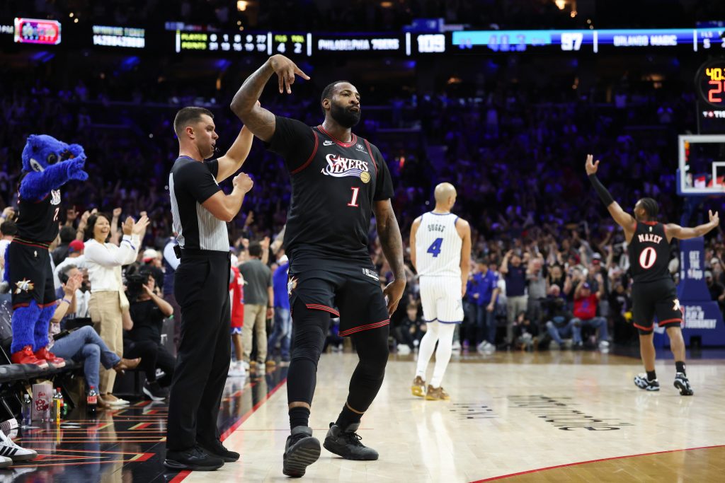 Apr 15, 2026; Philadelphia, Pennsylvania, USA; Philadelphia 76ers center Andre Drummond (1) reacts to his three pointer in the final minute of play in the fourth quarter against the Orlando Magic in an play-in round of the 2026 NBA Playoffs at Xfinity Mobile Arena.