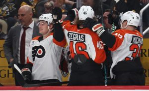 Apr 20, 2026; Pittsburgh, Pennsylvania, USA; The Philadelphia Flyers bench celebrates an empty net goal against the Pittsburgh Penguins during the third period in game two of the first round of the 2026 Stanley Cup Playoffs at PPG Paints Arena.